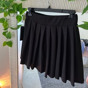 SOLD.  NWT flowy black skirt size medium